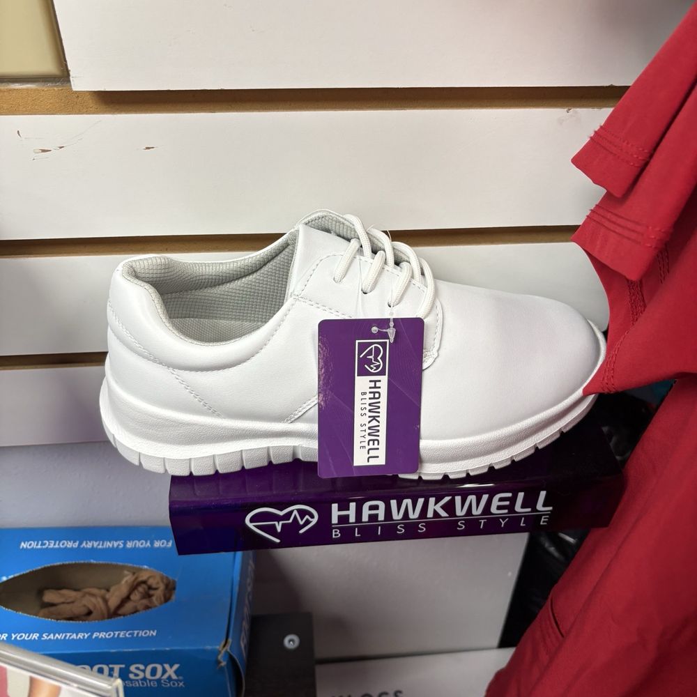 ASAHI MARKET team member assisting a customer with quality grocery selections in Oxnard, CA